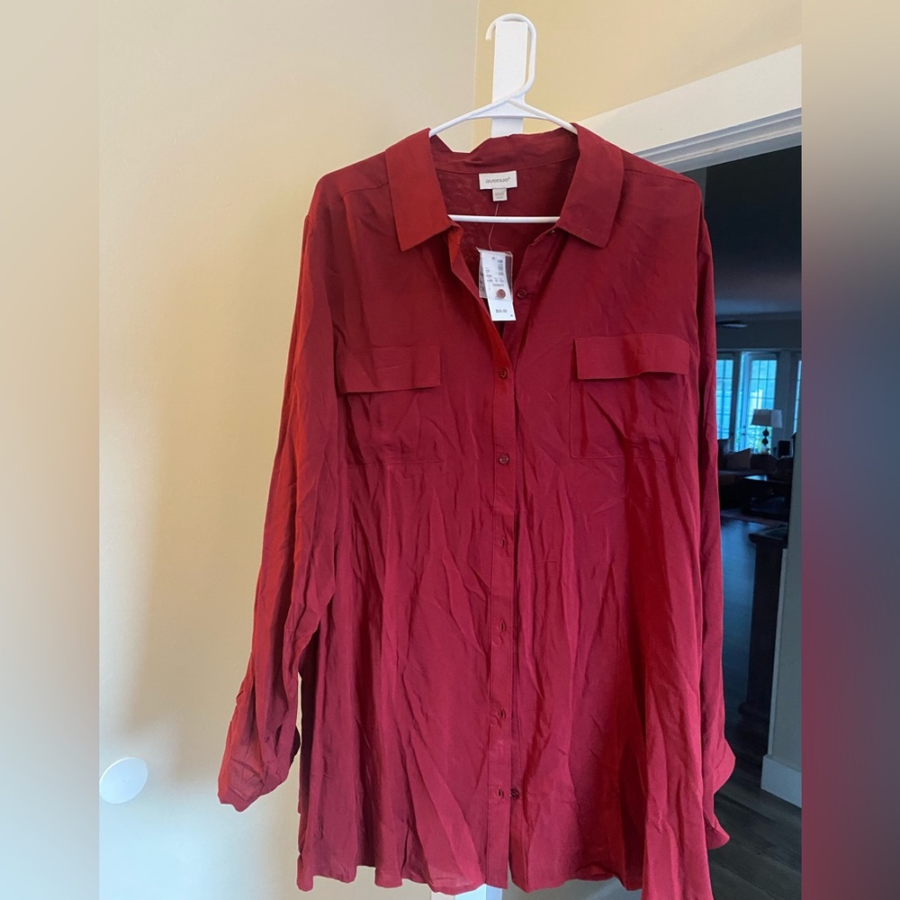 Avenue blouse long sleeve with roll up button cuff option.